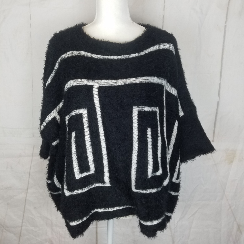 One A boxy short sleeve sweater